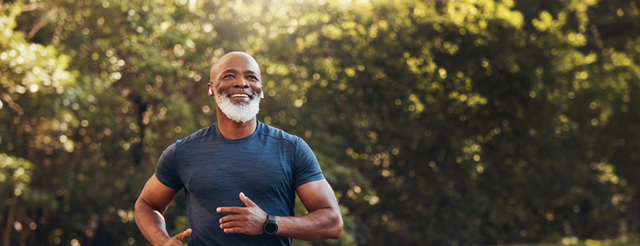Man running and smiling